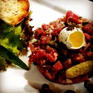 Steak Tartare - Local Welsh black fillet, sweet onions, Anglesey sea salt, Tellicherry cracked peppercorns, quails egg, capers & sourdough shards